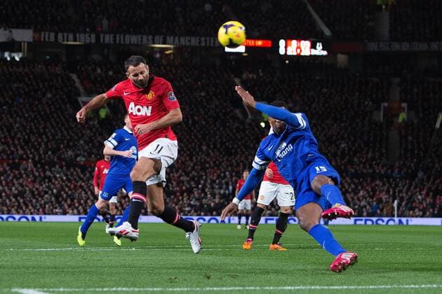 Ryan Giggs of Manchester United sends a header across goal - Manchester United vs. Everton - Barclays Premier League - Old Trafford - Manchester - 04 12 2013 Pic Philip Oldham Sportimage EDITORIAL USE ONLY. No use with unauthorised audio, video, data, fixture lists, club league logos or live services. Online in-match use limited to 120 images, no video emulation. No use in betting, games or single club league player publications.