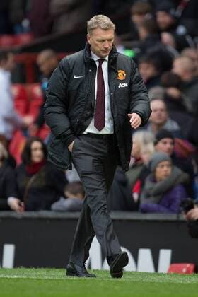 David Moyes, manager of Manchester United trudges down the pitch following defeat - Manchester United vs. Newcastle United - Barclays Premier League - Old Trafford - Manchester - 04 12 2013 Pic Philip Oldham Sportimage EDITORIAL USE ONLY. No use with unauthorised audio, video, data, fixture lists, club league logos or live services. Online in-match use limited to 120 images, no video emulation. No use in betting, games or single club league player publications.