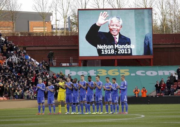 Chelsea players with a minute s applause for Nelson Mandela prior to kick-off - Football - Barclays Premiership - Stoke City vs Chelsea - Britannia Stadium Stoke - Season 13 14 - 7th December 2013 - Credit: Malcolm Couzens Sportimage EDITORIAL USE ONLY. No use with unauthorised audio, video, data, fixture lists, club league logos or live services. Online in-match use limited to 120 images, no video emulation. No use in betting, games or single club league player publications.