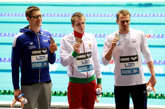 SCHWIMMEN - LEN Kurzbahn-EM 2013 HERNING,DAENEMARK,13.DEZ.2013 - DIVERS, SCHWIMMEN - LEN Kurzbahn-Europameisterschaften 2013, 400m Lagen der Herren, Siegerehrung. Bild zeigt Frederico Turrini (ITA), David Verraszto (HUN) und Gal Nevo (ISR). Keywords: Medaille. 