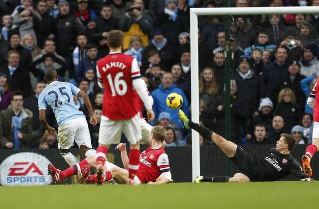 Manchester City s Fernandinho scoring his sides fifth goal Manchester City vs Arsenal - Premier League - Etihad Stadium - Manchester - England - 14 12 2013 - Pic David Klein Sportimage EDITORIAL USE ONLY. No use with unauthorised audio, video, data, fixture lists, club league logos or live services. Online in-match use limited to 120 images, no video emulation. No use in betting, games or single club league player publications.