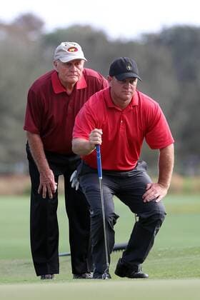 14 DEC 2013: Jack Nicklaus helps his son Gary line up a putt during the first round of the PNC Father-Son Challenge at The Ritz-Carlton Golf Club in Orlando, Florida. GOLF: DEC 14 PNC Father-Son Challenge - 1st Round Icon357131214236 EDITORIAL USE ONLY