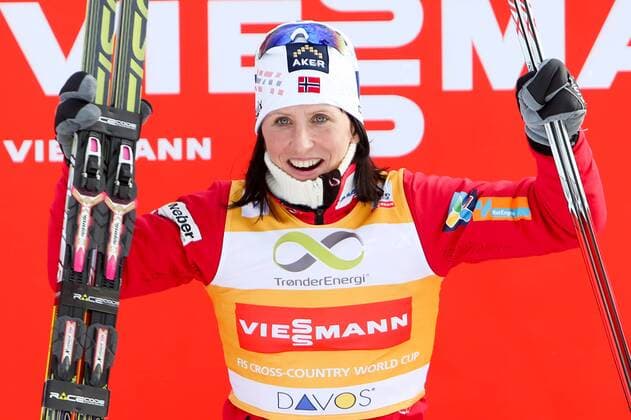 SKI NORDISCH - FIS WC Davos, 1,5km Sprint, Damen DAVOS,SCHWEIZ,15.DEZ.13 - SKI NORDISCH, LANGLAUF - FIS Weltcup, 1,5km Sprint der Damen, Freistil, Siegerehrung. Bild zeigt den Jubel von Marit Bjoergen (NOR).