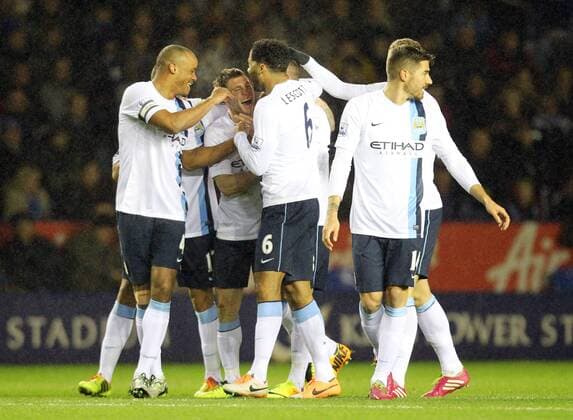 GOAL Manchester city s Aleksander Kolorov celebrates scoring to make it 1-0 against Leicester City Capital One Cup - Leicester City v Manchester City - England - 17th December - Pic Neil Plumb Sportimage EDITORIAL USE ONLY. No use with unauthorised audio, video, data, fixture lists, club league logos or live services. Online in-match use limited to 120 images, no video emulation. No use in betting, games or single club league player publications.