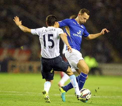 Leicester s Danny Drinkwater with Man City s Jesus Navas Capital One Cup - Leicester City v Manchester City - England - 17th December - Pic Neil Plumb Sportimage EDITORIAL USE ONLY. No use with unauthorised audio, video, data, fixture lists, club league logos or live services. Online in-match use limited to 120 images, no video emulation. No use in betting, games or single club league player publications.
