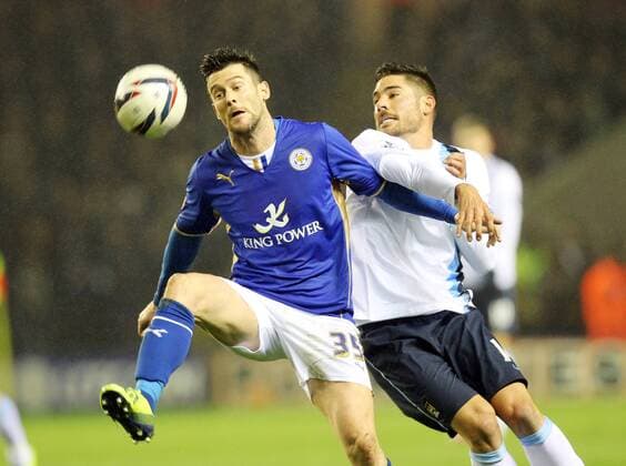 Leicester s David Nugent with Man City s Javi Garcia Capital One Cup - Leicester City v Manchester City - England - 17th December - Pic Neil Plumb Sportimage EDITORIAL USE ONLY. No use with unauthorised audio, video, data, fixture lists, club league logos or live services. Online in-match use limited to 120 images, no video emulation. No use in betting, games or single club league player publications.