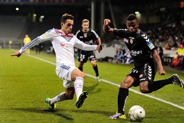 Mehdi Zeffane (lyon) vs Floyd Ayite (reims) FOOTBALL : Olympique Lyon vs. Stade Reims - Coupe de la ligue - 18 12 2013 FredericChambert Panoramic 