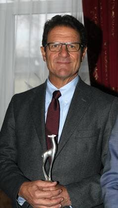 Russian Federation. Moscow. 18 dec. 2013. Russian Olympic Committee. Silver fellow deer-2013 award ceremony Federation journalist of Russia. Announce BEST TEN sportsmens, BEST TEAM & BEST COACH 2013. Fabio CAPELLO - Hd. coach Russian football national team with SILVER FELLOW DEER as BEST COACH of RUSSIA 2013. 