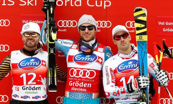 SKI ALPIN - FIS WC Val Gardena, Super G, Herren GROEDEN,ITALIEN,20.DEZ.13 - SKI ALPIN - FIS Weltcup, Super G der Herren, Siegerehrung. Bild zeigt den Jubel von Jan Hudec (CAN), Aksel Lund Svindal (NOR) und Adrien Theaux (FRA). 