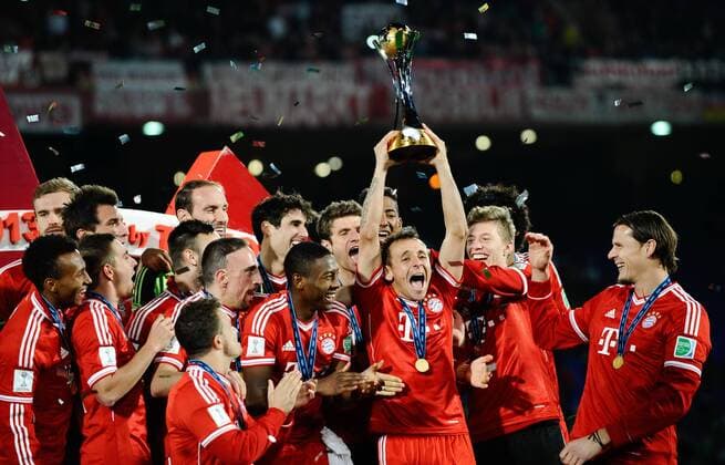 Dec 21, 2013; Marrakech, MOROCCO; Rafinha of München lifts the trophy after winning the FIFA Club World Cup Final between FC Bayern München and Raja Casablanca at Marrakech Stadium. FC Bayern München v Raja Casablanca  - ZUMAs11