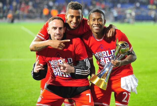 Dec. 21, 2013 - Marrakech, Marrocco - (L-R) FC Bayern Munchen players FRANCK RIBERY, JEROME BOATENG and DAVID ALABA with your trophy during the match between Raja Casablanca vs Bayern Munchen at Marrakech Stadium. Soccer 2013 - Bayern Munich Wins Club World Cup  - ZUMAm11