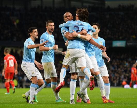 Vincent Kompany of Manchester City celebrates the equalising goal - Barclays Premier League - Manchester City vs Liverpool - Etihad Stadium - Manchester - England - 26th December 2013 - Picture Simon Bellis Sportimage EDITORIAL USE ONLY. No use with unauthorised audio, video, data, fixture lists, club league logos or live services. Online in-match use limited to 120 images, no video emulation. No use in betting, games or single club league player publications.