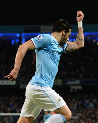 Alvaro Negredo of Manchester City celebrates scoring the second goal - Barclays Premier League - Manchester City vs Liverpool - Etihad Stadium - Manchester - England - 26th December 2013 - Picture Simon Bellis Sportimage EDITORIAL USE ONLY. No use with unauthorised audio, video, data, fixture lists, club league logos or live services. Online in-match use limited to 120 images, no video emulation. No use in betting, games or single club league player publications.