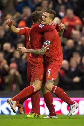 Daniel Agger of Liverpool celebrates his opening goal - Liverpool vs. Hull City - Barclays Premier League - Anfield - Liverpool - 01 01 2014 Pic Philip Oldham Sportimage EDITORIAL USE ONLY. No use with unauthorised audio, video, data, fixture lists, club league logos or live services. Online in-match use limited to 120 images, no video emulation. No use in betting, games or single club league player publications.