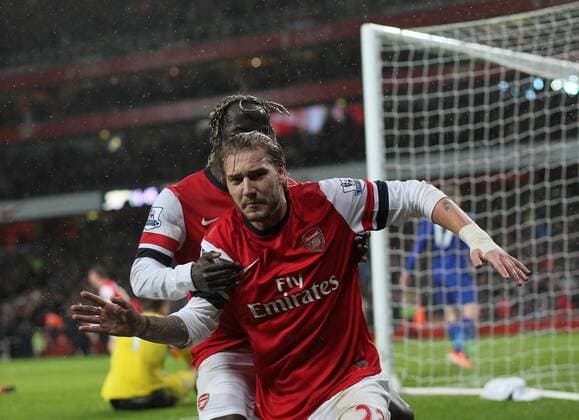 Arsenal s Nicklas Bendtner celebrates scoring his sides opening goal Arsenal vs Cardiff - Premier League - Emirates Stadium- London - England - 01 01 2014 - Pic David Klein Sportimage EDITORIAL USE ONLY. No use with unauthorised audio, video, data, fixture lists, club league logos or live services. Online in-match use limited to 120 images, no video emulation. No use in betting, games or single club league player publications.