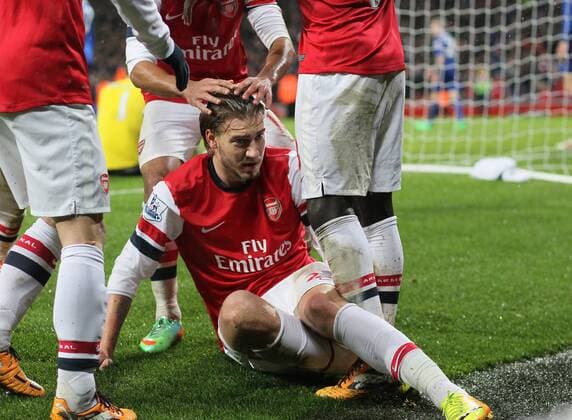 Arsenal s Nicklas Bendtner celebrates scoring his sides opening goal - Arsenal FC London vs Cardiff City - Premier League - Emirates Stadium- London - England - 01 01 2014 - EDITORIAL USE ONLY. No use with unauthorised audio, video, data, fixture lists, club league logos or live services. Online in-match use limited to 120 images, no video emulation. No use in betting, games or single club league player publications.