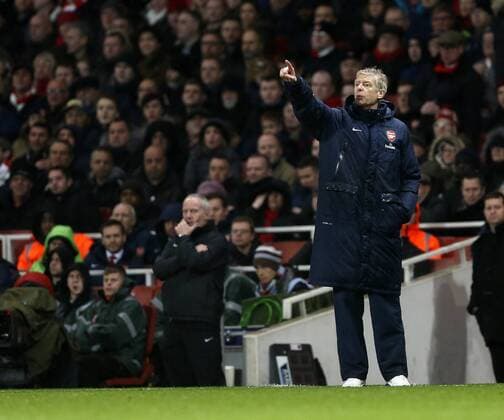 Arsenal s Arsene Wenger in action Arsenal vs Cardiff - Premier League - Emirates Stadium- London - England - 01 01 2014 - Pic David Klein Sportimage EDITORIAL USE ONLY. No use with unauthorised audio, video, data, fixture lists, club league logos or live services. Online in-match use limited to 120 images, no video emulation. No use in betting, games or single club league player publications.