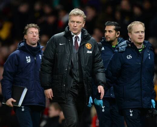 David Moyes manager of Manchester United looks at his players at half time - Barclays Premier League - Manchester Utd vs Tottenham - Old Trafford Stadium - Manchester - England - 1st January 2014 - Picture Simon Bellis Sportimage EDITORIAL USE ONLY. No use with unauthorised audio, video, data, fixture lists, club league logos or live services. Online in-match use limited to 120 images, no video emulation. No use in betting, games or single club league player publications.