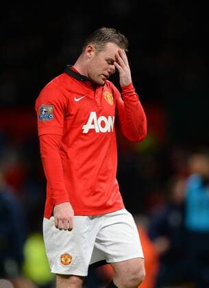 Wayne Rooney of Manchester United walks off dejected - Barclays Premier League - Manchester Utd vs Tottenham - Old Trafford Stadium - Manchester - England - 1st January 2014 - Picture Simon Bellis Sportimage EDITORIAL USE ONLY. No use with unauthorised audio, video, data, fixture lists, club league logos or live services. Online in-match use limited to 120 images, no video emulation. No use in betting, games or single club league player publications.