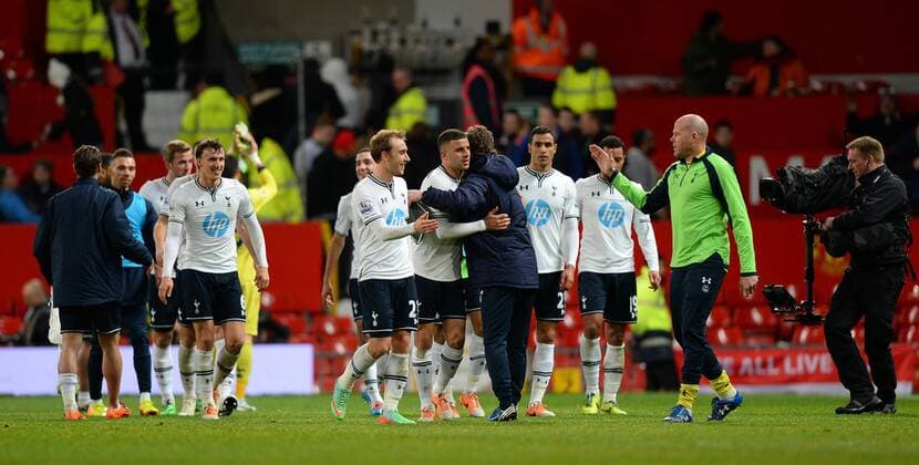 Tottenham players walk off happy at the end - Barclays Premier League - Manchester Utd vs Tottenham - Old Trafford Stadium - Manchester - England - 1st January 2014 - Picture Simon Bellis Sportimage EDITORIAL USE ONLY. No use with unauthorised audio, video, data, fixture lists, club league logos or live services. Online in-match use limited to 120 images, no video emulation. No use in betting, games or single club league player publications.