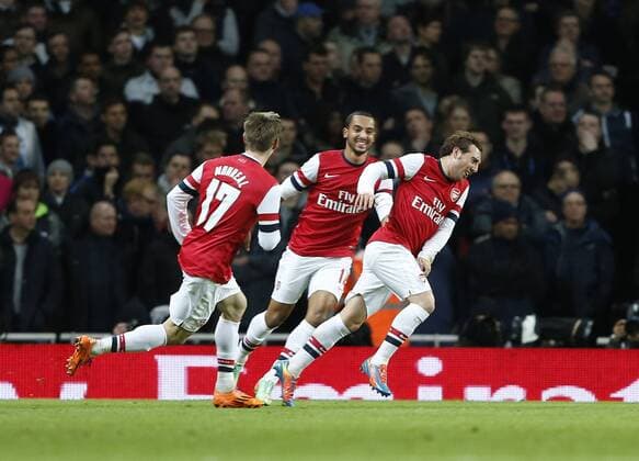 Arsenal s Santi Cazorla celebrates scoring his sides opening goal Arsenal vs Tottenham Hotspur - FA Cuo 3rd Round - Emirates Stadium- London - England - 04 01 2014 - Pic David Klein Sportimage EDITORIAL USE ONLY. No use with unauthorised audio, video, data, fixture lists, club league logos or live services. Online in-match use limited to 120 images, no video emulation. No use in betting, games or single club league player publications.