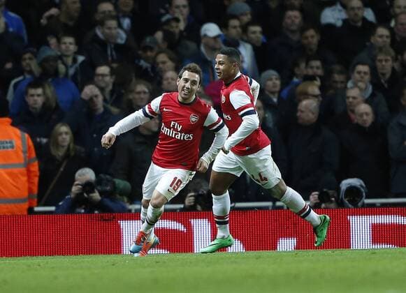 Arsenal s Santi Cazorla celebrates scoring his sides opening goal Arsenal vs Tottenham Hotspur - FA Cuo 3rd Round - Emirates Stadium- London - England - 04 01 2014 - Pic David Klein Sportimage EDITORIAL USE ONLY. No use with unauthorised audio, video, data, fixture lists, club league logos or live services. Online in-match use limited to 120 images, no video emulation. No use in betting, games or single club league player publications.