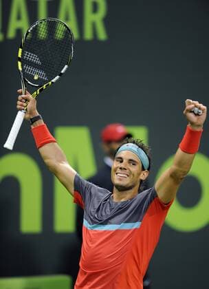 Rafael Nadal of Spain celebrates for victory after the men s singles final in Qatar Open tennis tournament, Jan. 4, 2014. Nadal won 2-1 to claim the champion. (Xinhua Chen Shaojin) (SP)QATAR-DOHA-TENNIS-MEN 