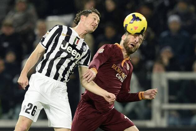 Db Torino 05 01 2014 - campionato di calcio serie A Juventus Turin vs AS Rom: Stephan Lichtsteiner-Daniele De Rossi 