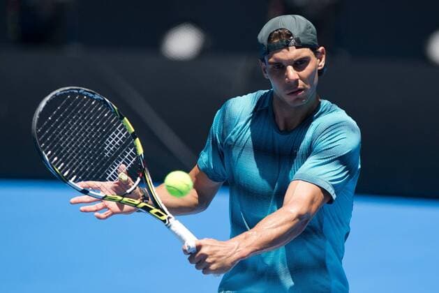 Rafael Nadal of Spain returns the ball during a training session for the Australia Open tennis tournament in Melbourne, Australia, Jan. 8, 2014. (Xinhua Bai Xue) (SP)AUSTRALIA-MELBOURNE-TENNIS-AUSTRALIA OPEN-TRAINING 