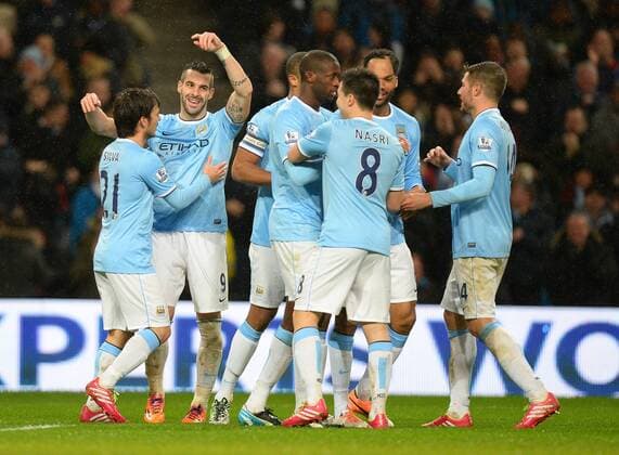 Alvaro Negredo of Manchester City celebrates his hayrick goal - Capital One Cup Semi Final 1st leg - Manchester City vs West Ham Utd - Etihad Stadium - Manchester - England - 8th January 2014 - Picture Simon Bellis Sportimage EDITORIAL USE ONLY. No use with unauthorised audio, video, data, fixture lists, club league logos or live services. Online in-match use limited to 120 images, no video emulation. No use in betting, games or single club league player publications.