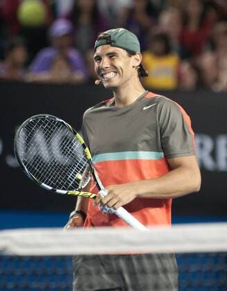 (140111) -- MELBOURNE, Jan. 11, 2014 (Xinhua) -- Rafael Nadal of Spain smiles during the Kids Day exhibition match ahead of the Australian Open tennis tournament in Melbourne, Australia, Jan. 11, 2014. (Xinhua Bai Xue) (SP)AUSTRALIA-MELBOURNE-TENNIS 
