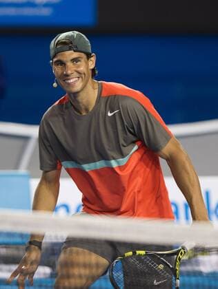 (140111) -- MELBOURNE, Jan. 11, 2014 (Xinhua) -- Rafael Nadal of Spain reacts during the Kids Day exhibition match ahead of the Australian Open tennis tournament in Melbourne, Australia, Jan. 11, 2014. (Xinhua Bai Xue) (SP)AUSTRALIA-MELBOURNE-TENNIS 