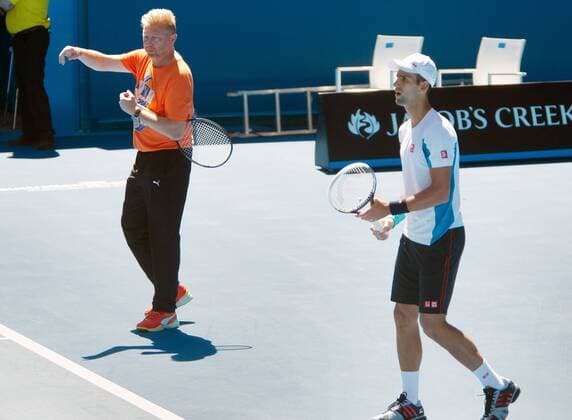 TENNIS - ATP, Australian Open 2014 MELBOURNE,AUSTRALIEN,11.JAN.14 - TENNIS - ATP Tennis Herren World Tour, Grand Slam, Australian Open, Training. Bild zeigt Trainer Boris Becker und Novak Djokovic (SRB). 