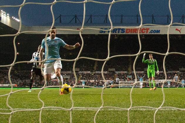 Alvaro Negredo of Manchester City scores his sides second goal - Newcastle United vs. Manchester City - Barclays Premier League - St James Park - Newcastle - 12 01 2014 EDITORIAL USE ONLY. No use with unauthorised audio, video, data, fixture lists, club league logos or live services. Online in-match use limited to 120 images, no video emulation. No use in betting, games or single club league player publications.
