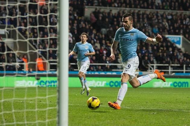 Alvaro Negredo of Manchester City scores his sides second goal - Newcastle United vs. Manchester City - Barclays Premier League - St James Park - Newcastle - 12 01 2014 EDITORIAL USE ONLY. No use with unauthorised audio, video, data, fixture lists, club league logos or live services. Online in-match use limited to 120 images, no video emulation. No use in betting, games or single club league player publications.