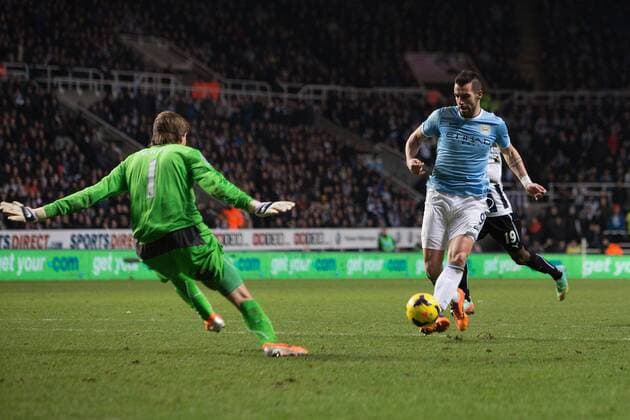 Alvaro Negredo of Manchester City scores his sides second goal - Newcastle United vs. Manchester City - Barclays Premier League - St James Park - Newcastle - 12 01 2014 EDITORIAL USE ONLY. No use with unauthorised audio, video, data, fixture lists, club league logos or live services. Online in-match use limited to 120 images, no video emulation. No use in betting, games or single club league player publications.