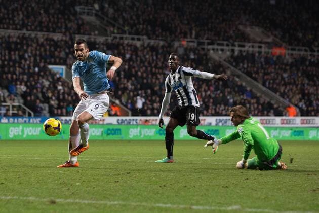 Alvaro Negredo of Manchester City scores his sides second goal - Newcastle United vs. Manchester City - Barclays Premier League - St James Park - Newcastle - 12 01 2014 EDITORIAL USE ONLY. No use with unauthorised audio, video, data, fixture lists, club league logos or live services. Online in-match use limited to 120 images, no video emulation. No use in betting, games or single club league player publications.