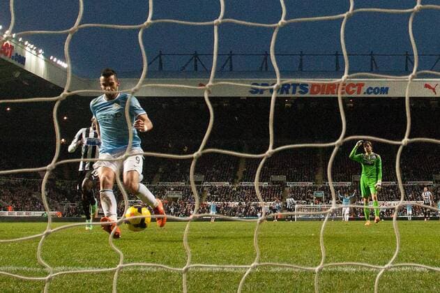 Alvaro Negredo of Manchester City scores his sides second goal - Newcastle United vs. Manchester City - Barclays Premier League - St James Park - Newcastle - 12 01 2014 EDITORIAL USE ONLY. No use with unauthorised audio, video, data, fixture lists, club league logos or live services. Online in-match use limited to 120 images, no video emulation. No use in betting, games or single club league player publications.