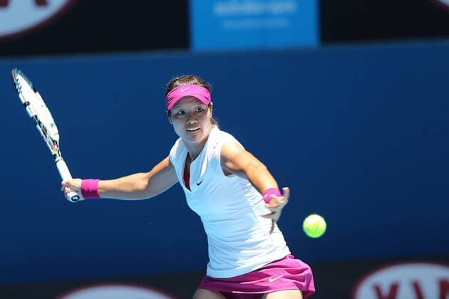 (140113) -- MELBOURNE, Jan. 13, 2014 (Xinhua) -- Li Na of China returns the ball during her women s singles first round match at 2014 Australian Open tennis tournament in Melbourne, Australia, Jan. 13, 2014. Li Na won 2-0. (Xinhua Xu Yanyan) (SP)AUSTRALIA-MELBOURNE-TENNIS-AUSTRALIA OPEN 