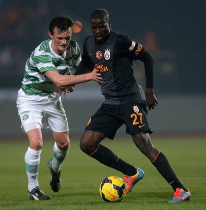 Antalya Cup Final Match between Galatasaray and Celtic at Akdeniz University Stadium in Antalya, n january 12, 2014. Score: Galatasaray 5 - Celtic 4 ( penalty ) Pictured: Liam Henderson of Celtic and Emmanuel Eboue of Galatasaray. 