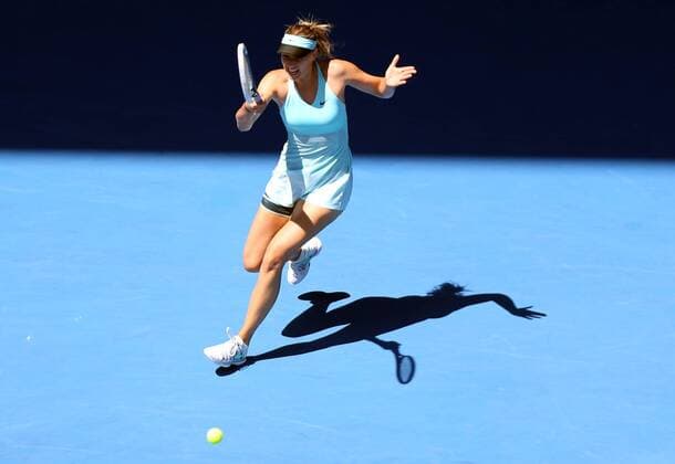 (140116) -- MELBOURNE, Jan. 16, 2014 (Xinhua) -- Maria Sharapova of Russia hits a return during her women s singles second round match at 2014 Australian Open tennis tournament in Melbourne, Australia, Jan. 16, 2014. 