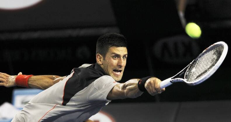 (140117) -- MELBOURNE, Jan. 17, 2014 (Xinhua) -- Novak Djokovic of Serbia hits a return during the men s singles third round match at 2014 Australian Open tennis tournament in Melbourne, Australia, Jan. 17, 2014. (Xinhua Jin Linpeng) (SP)AUSTRALIA-MELBOURNE-TENNIS-AUSTRALIAN OPEN 