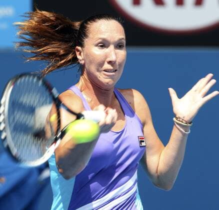 Jelena Jankovic of Serbia hits a return during the women s singles third round match at 2014 Australian Open tennis tournament in Melbourne, Australia, Jan. Jan. 18, 2014. (Xinhua Jin Linpeng) (SP)AUSTRALIA-MELBOURNE-TENNIS-AUSTRALIAN OPEN 