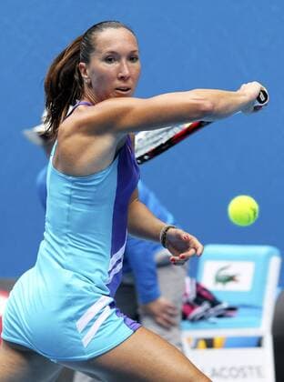 Jelena Jankovic of Serbia hits a return during the women s singles third round match at 2014 Australian Open tennis tournament in Melbourne, Australia, Jan. Jan. 18, 2014. (Xinhua Jin Linpeng) (SP)AUSTRALIA-MELBOURNE-TENNIS-AUSTRALIAN OPEN 