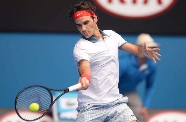 Roger Federer of Switzerland returns the ball during the men s singles 3rd round match at 2014 Australian Open tennis tournament in Melbourne, Australia, Jan. 18, 2014. (Xinhua Li Jundong) (SP)AUSTRALIA-MELBOURNE-TENNIS-AUSTRALIAN OPEN 