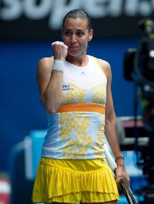 Flavia Pennetta of Italy celebrates at Australian Open tennis tournament in Melbourne, Australia, Jan. 19, 2014. (Xinhua Bai Xue) (SP)AUSTRALIA-MELBOURNE-TENNIS-PENNETTA 