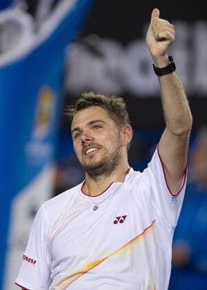 Stanislas Wawrinka of Switzerland celebrates victory after his men s singles fourth round match at 2014 Australian Open tennis tournament in Melbourne, Australia on Jan. 19, 2014. (Xinhua Bai Xue) (SP)AUSTRALIA-MELBOURNE-TENNIS 