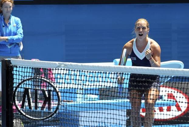 (140120) -- MELBOURNE, Jan. 20, 2014 (Xinhua) -- Dominika Cibulkova of Slovakia celebrates after winning her women s singles fourth round match at Australian Open tennis tournament in Melbourne, Australia, Jan. 20, 2014. . (Xinhua Jin Linpeng) (SP)AUSTRALIA-MELBOURNE-TENNIS 