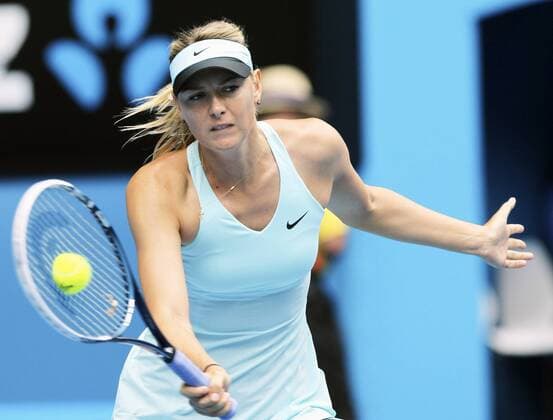 (140120) -- MELBOURNE, Jan. 20, 2014 (Xinhua) -- Maria Sharapova of Russia hits a return during her women s singles fourth round match at Australian Open tennis tournament in Melbourne, Australia, Jan. 20, 2014. . (Xinhua Jin Linpeng) (SP)AUSTRALIA-MELBOURNE-TENNIS 