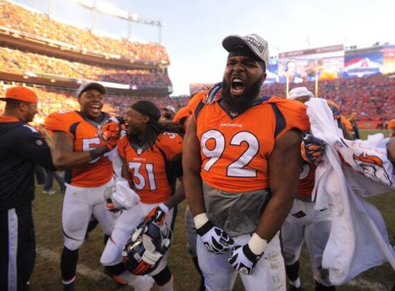 Jan. 18, 2014 - Denver, CO, USA - Broncos players celebrate at the end of the AFC championship game at Sports Authority Field at Mile High in Denver on Sunday, Jan. 19, 2014. The Denver Broncos defeated the New England Patriots, 26-16. BRONCOS PATRIOTS - ZUMAm67